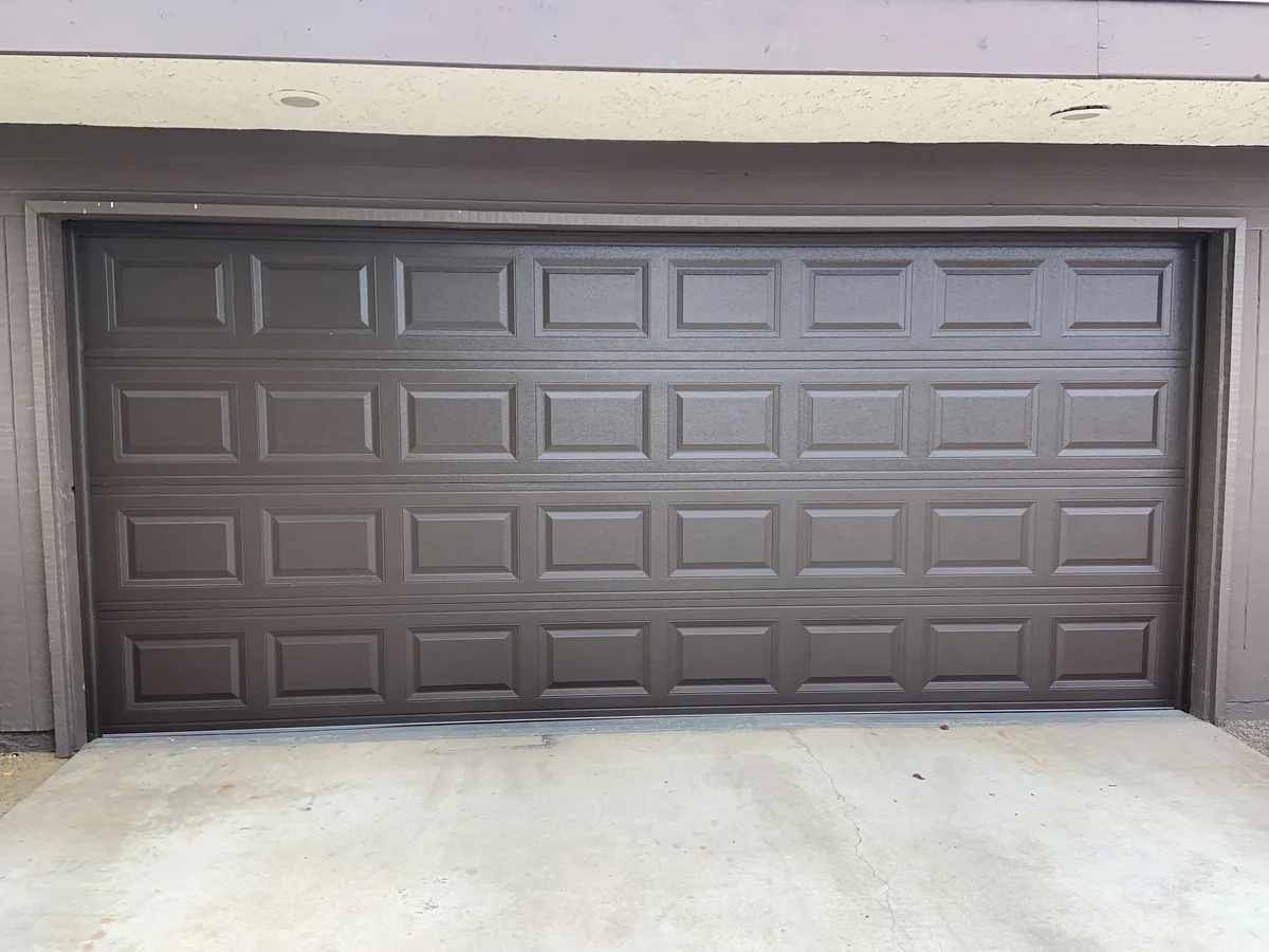 Dark brown short panel garage door