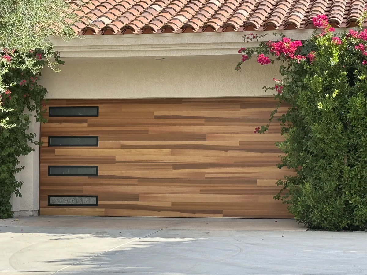 Modern horizontal wood garage door with narrow window slots